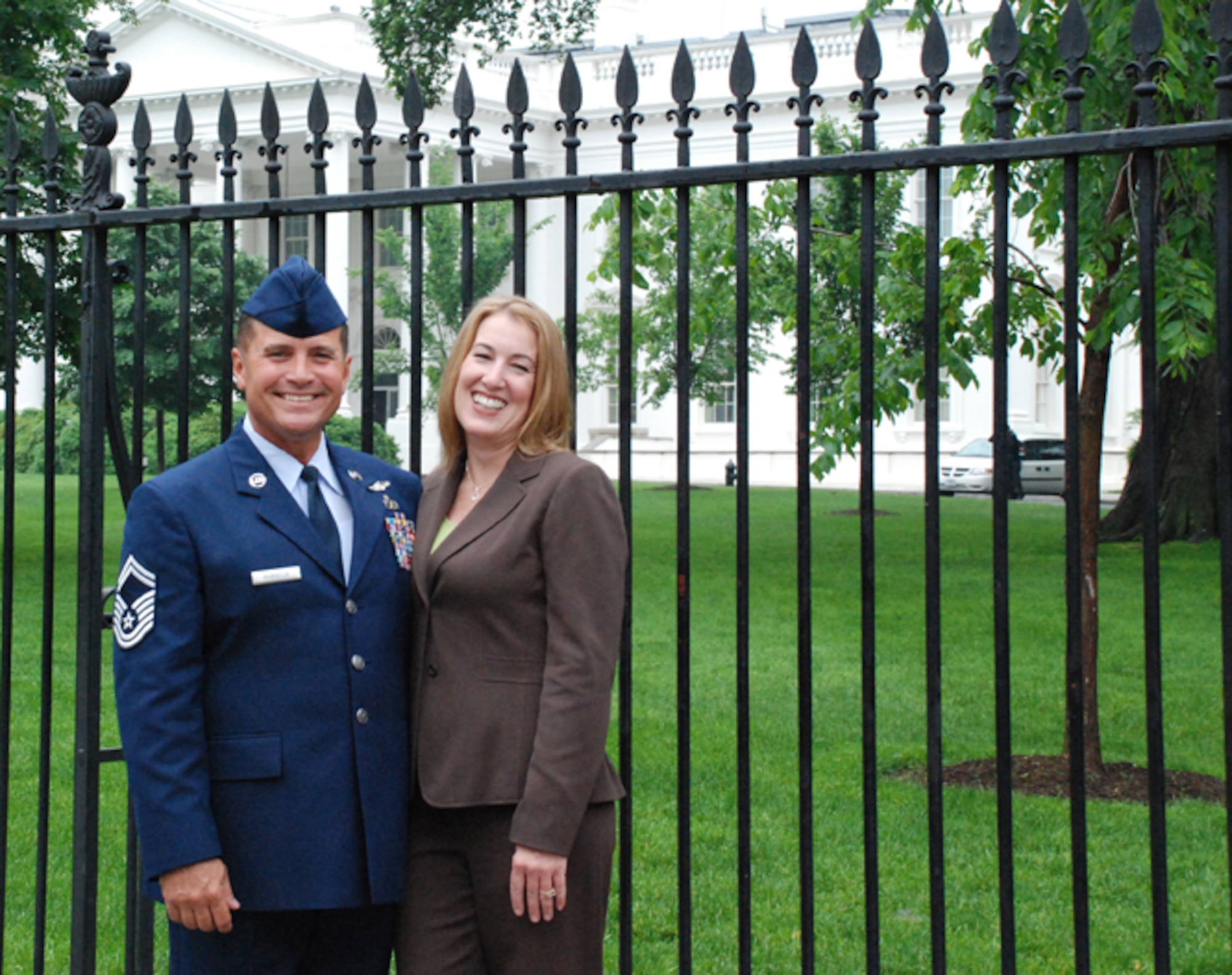 PATRICK AIR FORCE BASE, Fla. -- Senior Master Sgt. Rene Rubiella and his wife Terry pose in front of the White House during their trip to Washington DC.  Sergeant Rubiella was honored at the White House for his volunteer community service and was honored with the USA Freedom Corps President's Volunteer Service Award.  He has volunteered almost 20,000 hours of his time to enrich the local community.  (U.S. Air Force photo/Capt. Cathleen Snow)