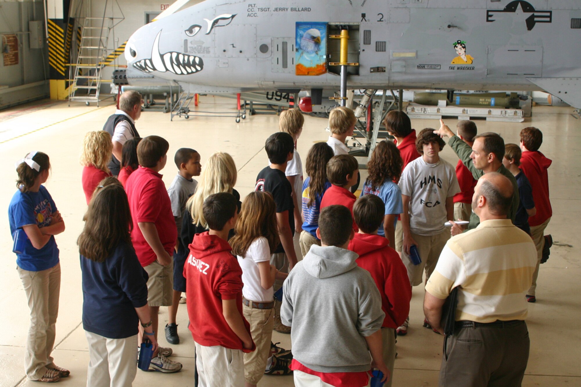 Lt. Col. John S. Russell, 47th Fighter Squadron, director of operations, informs students from Haughton Middle School's Aero Science Space Class about the combat capabilities of the A-10 Thunderbolt during a tour of the 917th Wing, Friday, May 16, 2008. The students also visited the engine and armament shops, Red River Dinning facility, a B-52 Stratofortress and wrapped up their tour at the 8th Air Force Museum. (U.S. Air Force photo/Tech. Sgt. Jeff Walston)