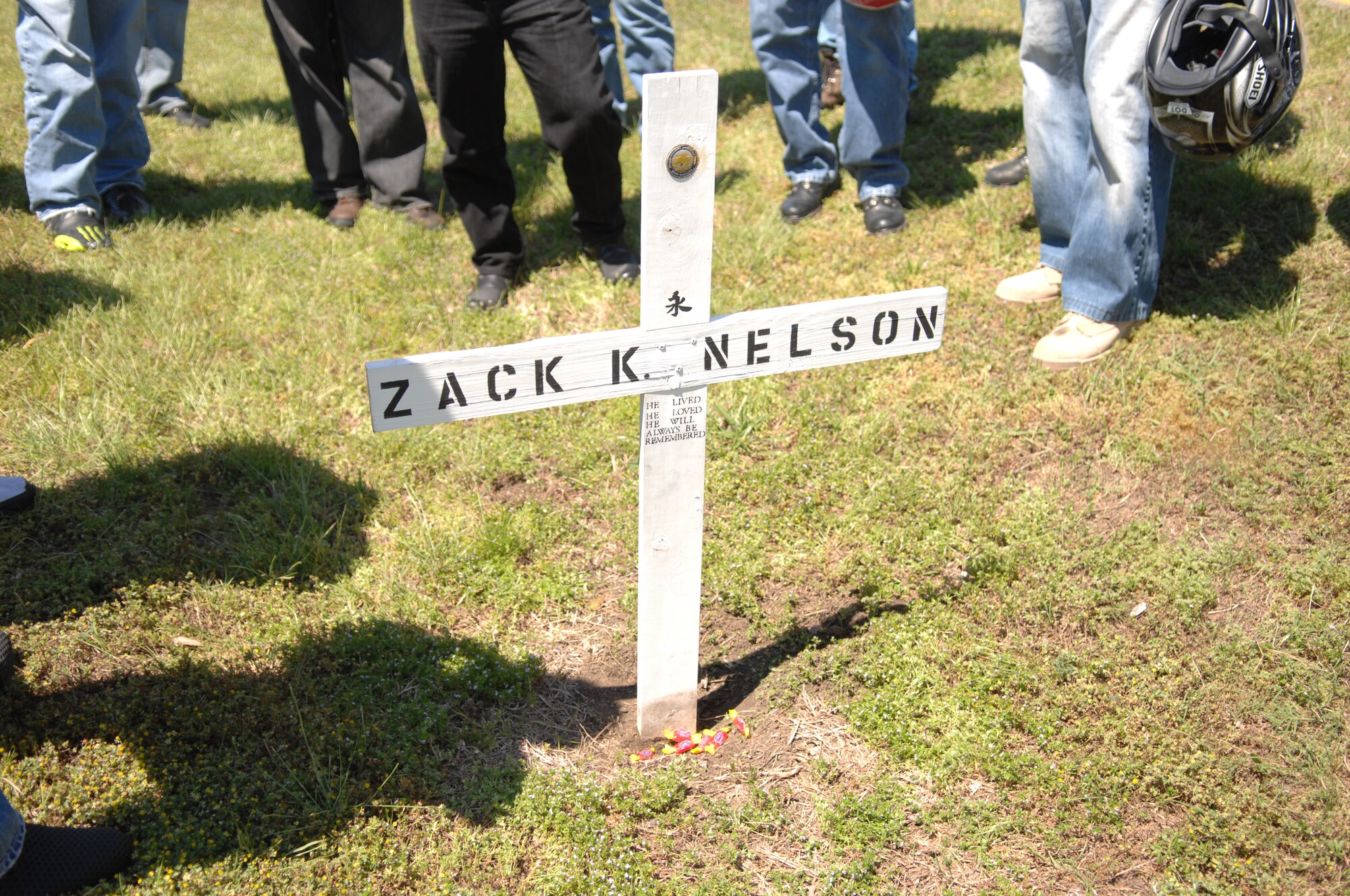 LANGLEY AIR FORCE BASE, Va. -- Motorcyclists gather around a memorial marker in honor of Airman 1st Class Zack Nelson May 17. Airman Nelson lost his life in a motorcycle accident one year ago.  The memorial ride was coordinated by Senior Airman Jeffrey Noble, 1st Aircraft Maintenance Squadron, in memory of his friend and to promote motorcycle safety. (U.S. Air Force photo /Tech. Sgt. April Wickes)