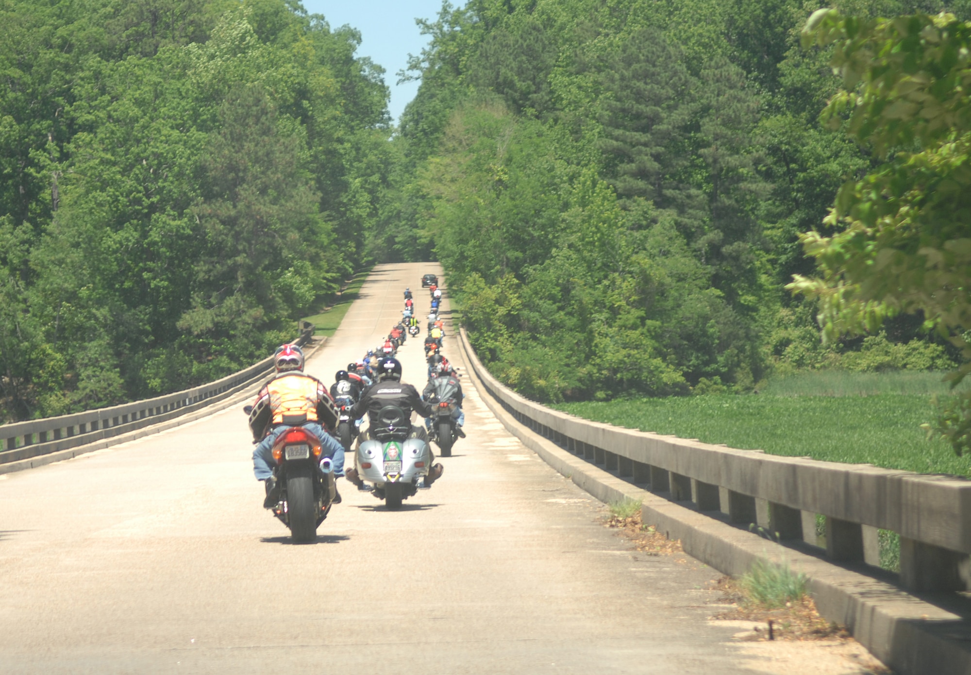 LANGLEY AIR FORCE BASE, Va. -- More than 30 motorcyclists travel down the Colonial Parkway during a memorial motorcycle ride May 17. The 75-mile ride was in honor of Airman 1st Class Zack Nelson, who lost his life in a motorcycle accident one year ago.  The memorial ride was coordinated by Senior Airman Jeffrey Noble, 1st Aircraft Maintenance Squadron, in memory of his friend and to promote motorcycle safety. (U.S. Air Force photo /Tech. Sgt. April Wickes)