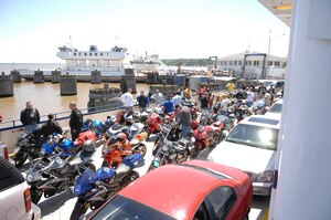 LANGLEY AIR FORCE BASE, Va.-- More than 30 motorcyclists cross the James River on the Jamestown Ferry during a memorial motorcycle ride May 17. The 75-mile ride was in honor of Airman 1st Class Zack Nelson, who lost his life in a motorcycle accident one year ago. The memorial ride was coordinated by Senior Airman Jeffrey Noble, 1st Aircraft Maintenance Squadron, in memory of his friend and to promote motorcycle safety.  (U.S. Air Force photo /Tech. Sgt. April Wickes)