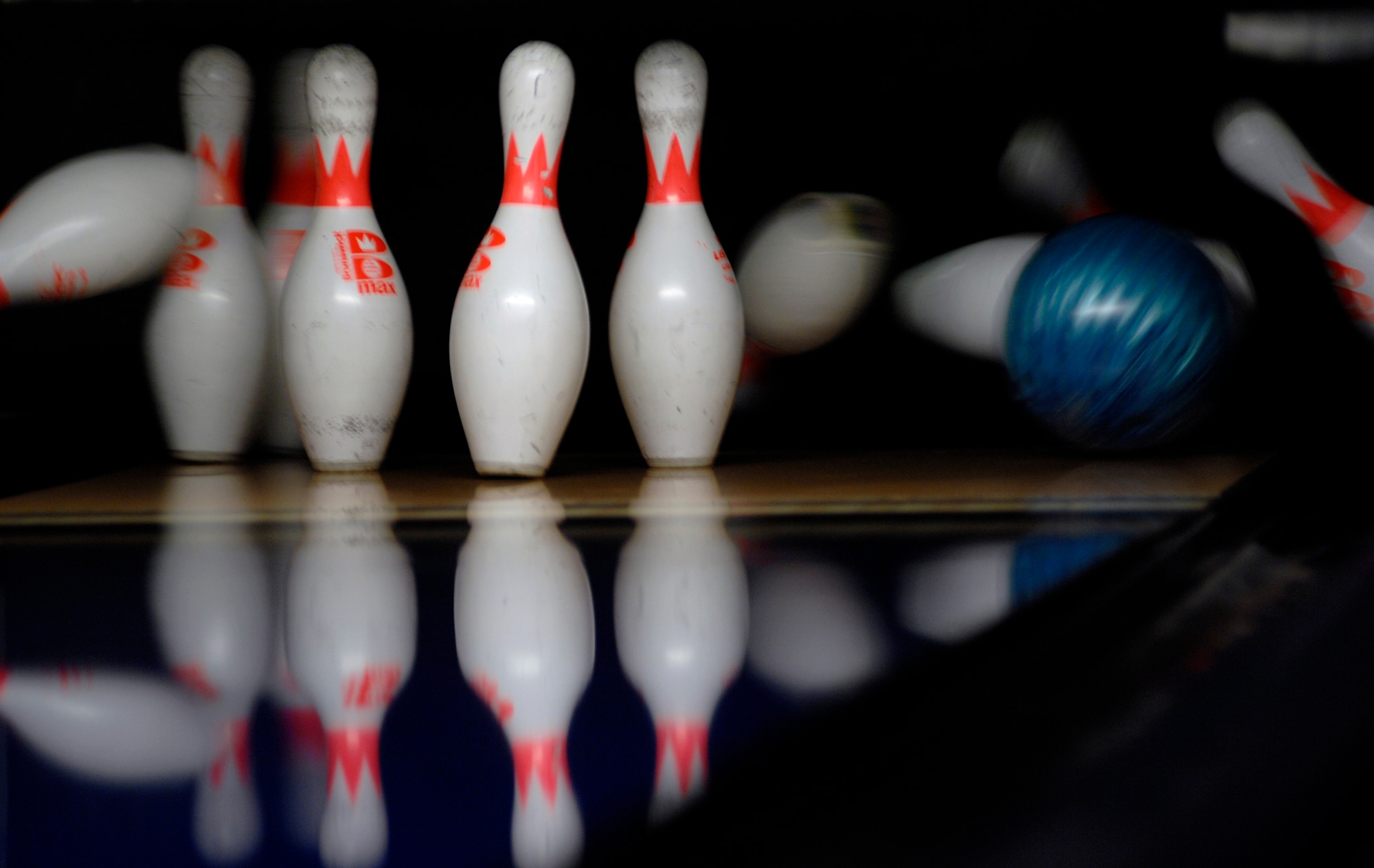 AVIANO AIR BASE, Italy --  A bowling ball crashes into a set of pins May 17 at the Ten Pin Inn. The bowling center has a digital scoring system so that you can spend more time bowling and less time keeping up with the score.  (U.S. Air Force photo/Airman 1st Class Ashley Wood)