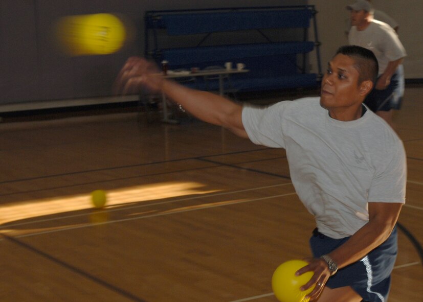 DYESS AIR FORCE BASE, Texas -- A Dyess Airman throws a dodgeball during the annual Sports Day, May 16. Airman competed in several sports such as basketball, walleyball, and a home run derby. (U.S. Air Force Photo by Airman 1st Class Micheal Breaux) 
