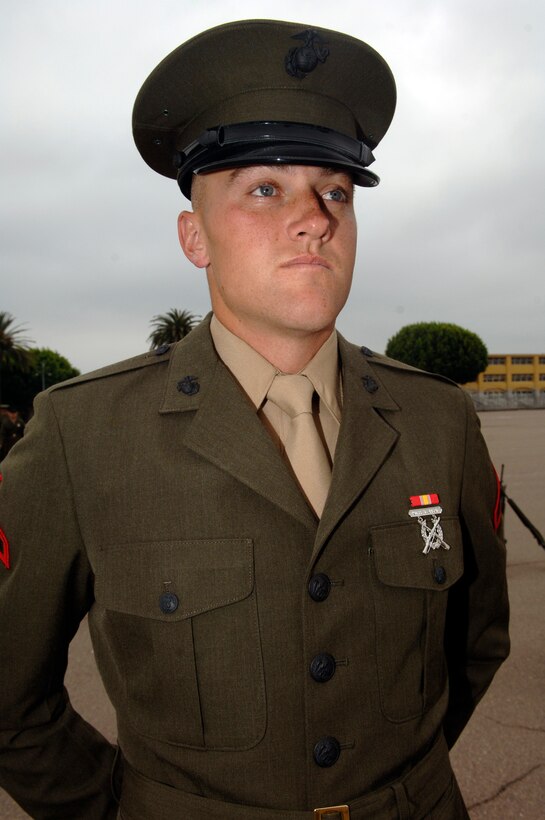 Pfc. Dale Query waits to be inspected during the Battalion Commanders Inspection on Shepherd Memorial Drill Field, Tuesday.