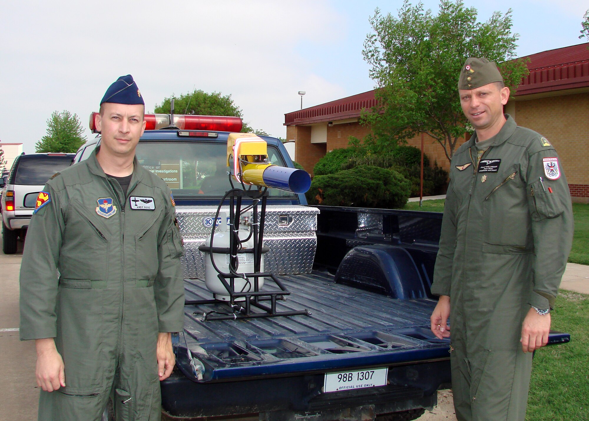 Maj. Josef "Supa Sep" Willegger, Austrian Air Force C-130 pilot (right) visits U.S. Air Force Maj. Andy "Axl" Rose, chief of the 71st Flying Training Wing Safety office here. Maj. Josef Willegger recently completed a three month International Flight Safety Officer's Course at Kirtland Air Force Base.
