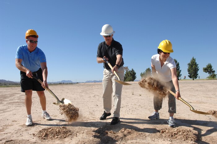 From left to right, Mr. Frank Wertin, 99th Civil Engineer Squadron civil structures project team chief, Col. Michael Bartley, 99th Air Base Wing commander and Lt. Col. Elizabeth Demmons, 99th Services Squadron commander, “break ground” on the new, state-of-the-art Sunrise Vista Golf Course club house, Friday, May 16, 2008 at Nellis Air Force Base, Nev. The new 11,000 square foot club house will offer better amenities to Nellis golfers and help modernize the course. (U.S. Air Force photo/Senior Airman Larry E. Reid Jr.) 