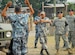 SOTO CANO AIR BASE, Honduras--Army Sgt. Manuel Perez-Hernandez guides a Honduran National Police Academy cadet through a high-risk traffic stop exercise here May 16 during a subject matter exchange between Joint Task Force-Bravo?s Joint Security Forces personnel and more than two dozen cadets. The information exchanges have provided instruction to more than 1,200 Honduran military and police personnel annually. (U.S. Air Force photo by Tech. Sgt. William Farrow)