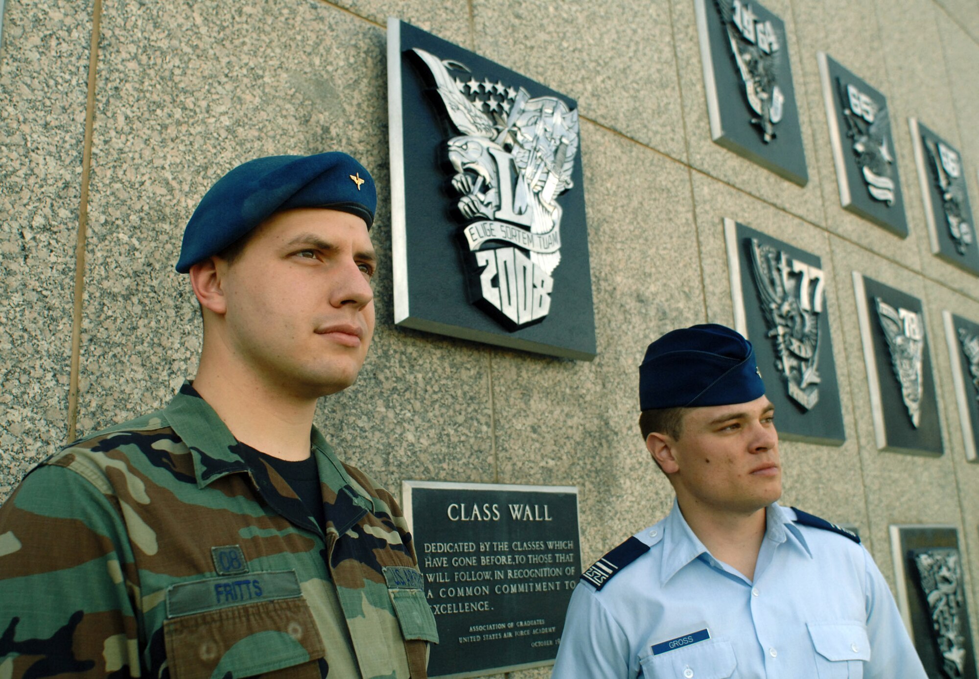 Cadets 1st Class Nick Fritts (left) and Aaron Gross reflect on their careers May 12 near the class wall in the Air Force Academy in Colorado. The cadets will be the first graduates to go directly from the Academy to the Air Force Institute of Technology's cyber warfare track. In addition to computer science, core courses directly supporting the Academy's cyberwarrior development draw from a variety of departments, including law, electrical engineering, philosophy, physics, chemistry, behavioral sciences, engineering and military strategic studies. (U.S. Air Force photo/Staff Sgt. Tim Jenkins) 