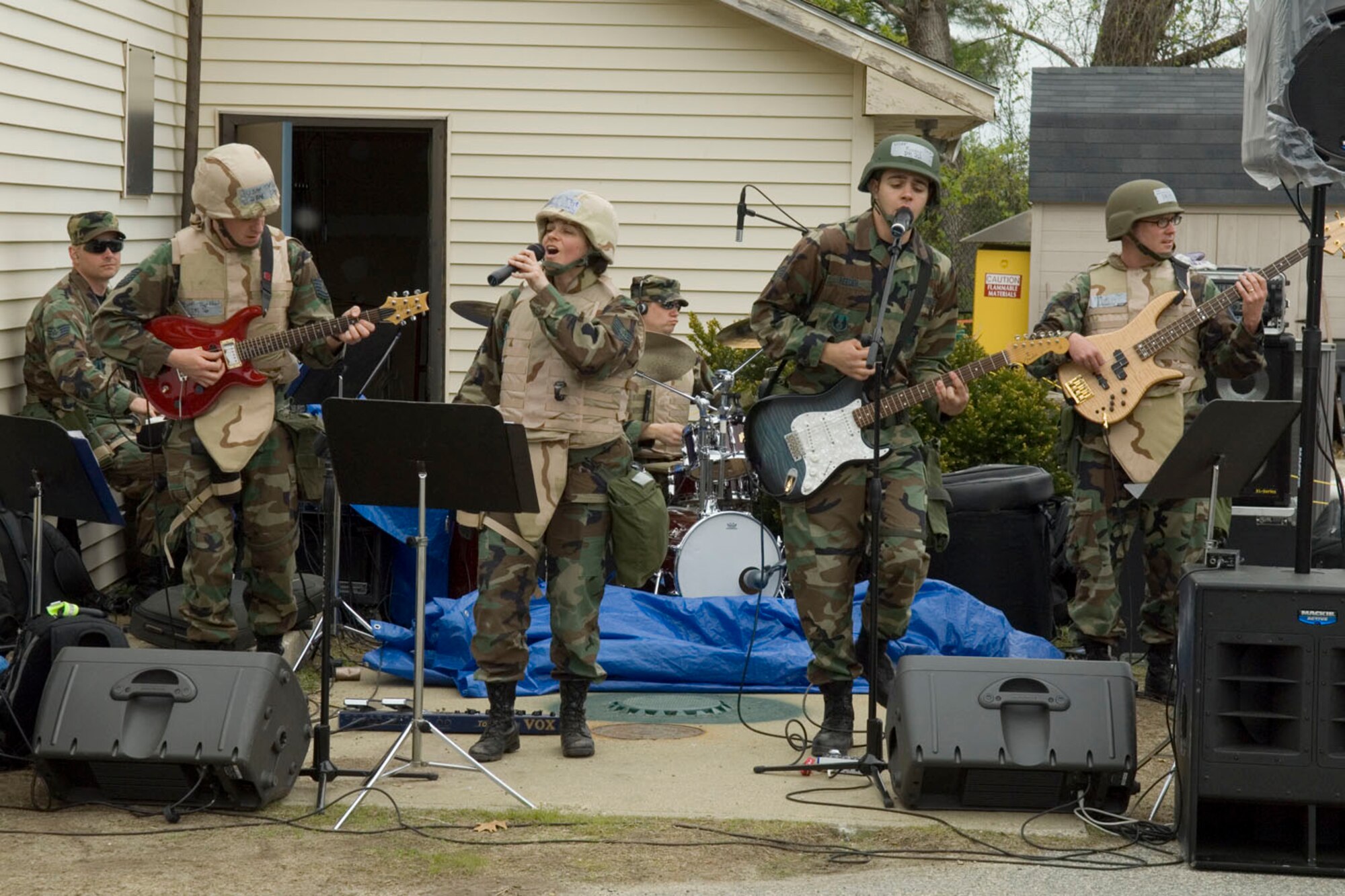 HANSCOM AFB, Mass. – The Air Force Band of Liberty’s rock ensemble, the Afterburner, performs at Camp Patriot as part of deployment preparation during a Base Readiness Exercise here May 15. (U.S. Air Force photo by Rick Berry.)