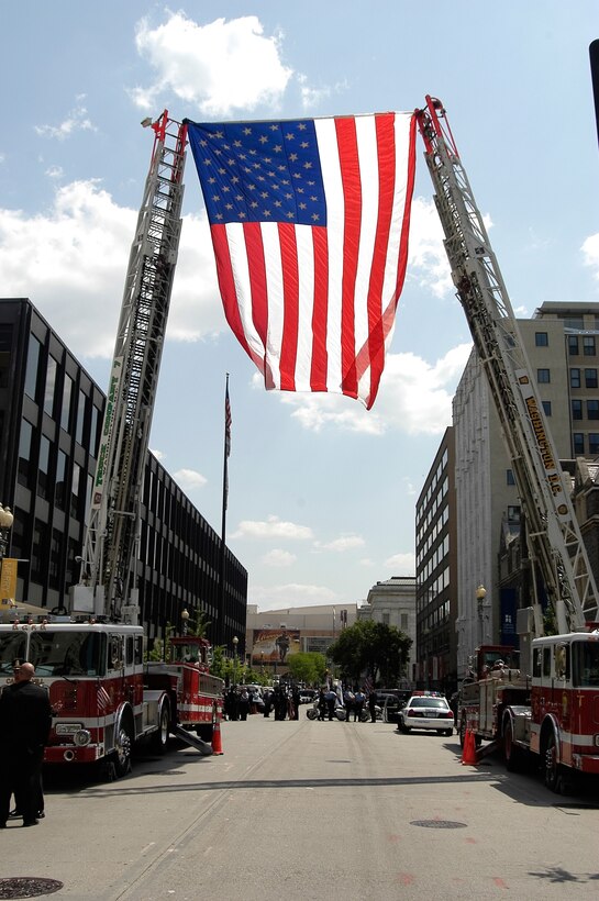 An American is flag hung in front of Saint Patrick Church in Washington, D.C. by the metropolitan fire department in observance of the Fourteenth Annual Blue Mass held May 6. The mass paid special tribute to 24 law enforcement officers from the metropolitan area that died in the line of duty, including six members of the Air Force Office of Special Investigations. Those members were: Special Agents Ryan Balmer, Matthew Kuglics, Thomas Crowell, Nathan Schuldheiss, David Wieger, and Michael Thyssen. (U.S. Air Force photo/Capt. David Wilson)