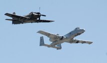 An A-1 “Skyrider” flies with an Air Combat Command A-10 “Thunderbolt II” May 16 during a practice for the Heritage Flight which was one of the featured events at this year's Air Show and Open House. (U.S. Air Force photo/Airman 1st Class Emerald Ralston)