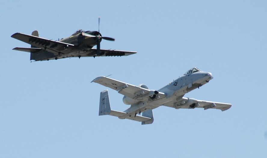 An A-1 “Skyrider” flies with an Air Combat Command A-10 “Thunderbolt II” May 16 during a practice for the Heritage Flight which was one of the featured events at this year's Air Show and Open House. (U.S. Air Force photo/Airman 1st Class Emerald Ralston)