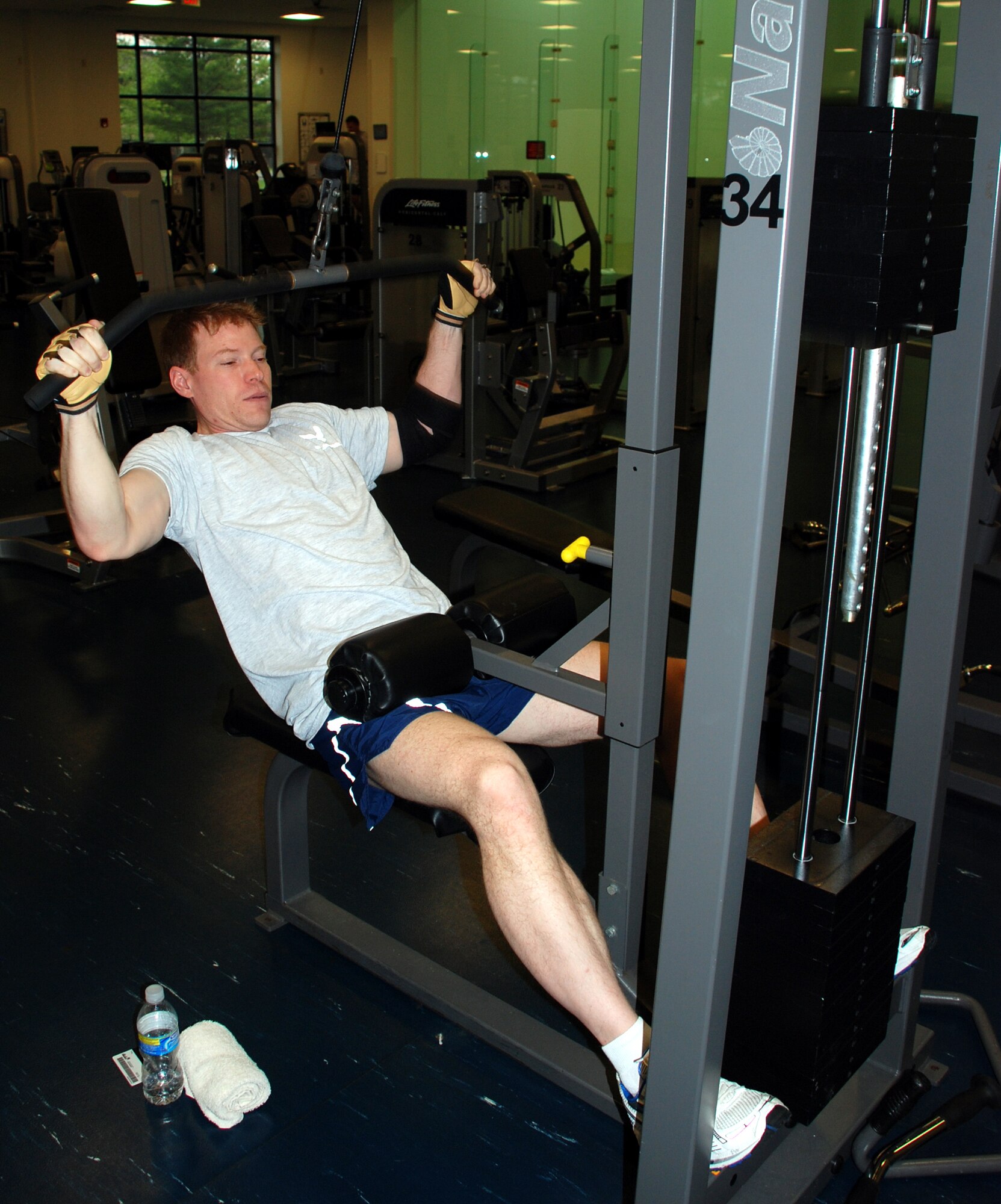 Maj. Andrew Beale, 76 Air Refueling Squadron instructor pilot, finishes up his workout at the fitness center here recently. (U.S. Air Force photo/Airman 1st Class Rebekah Phy) 