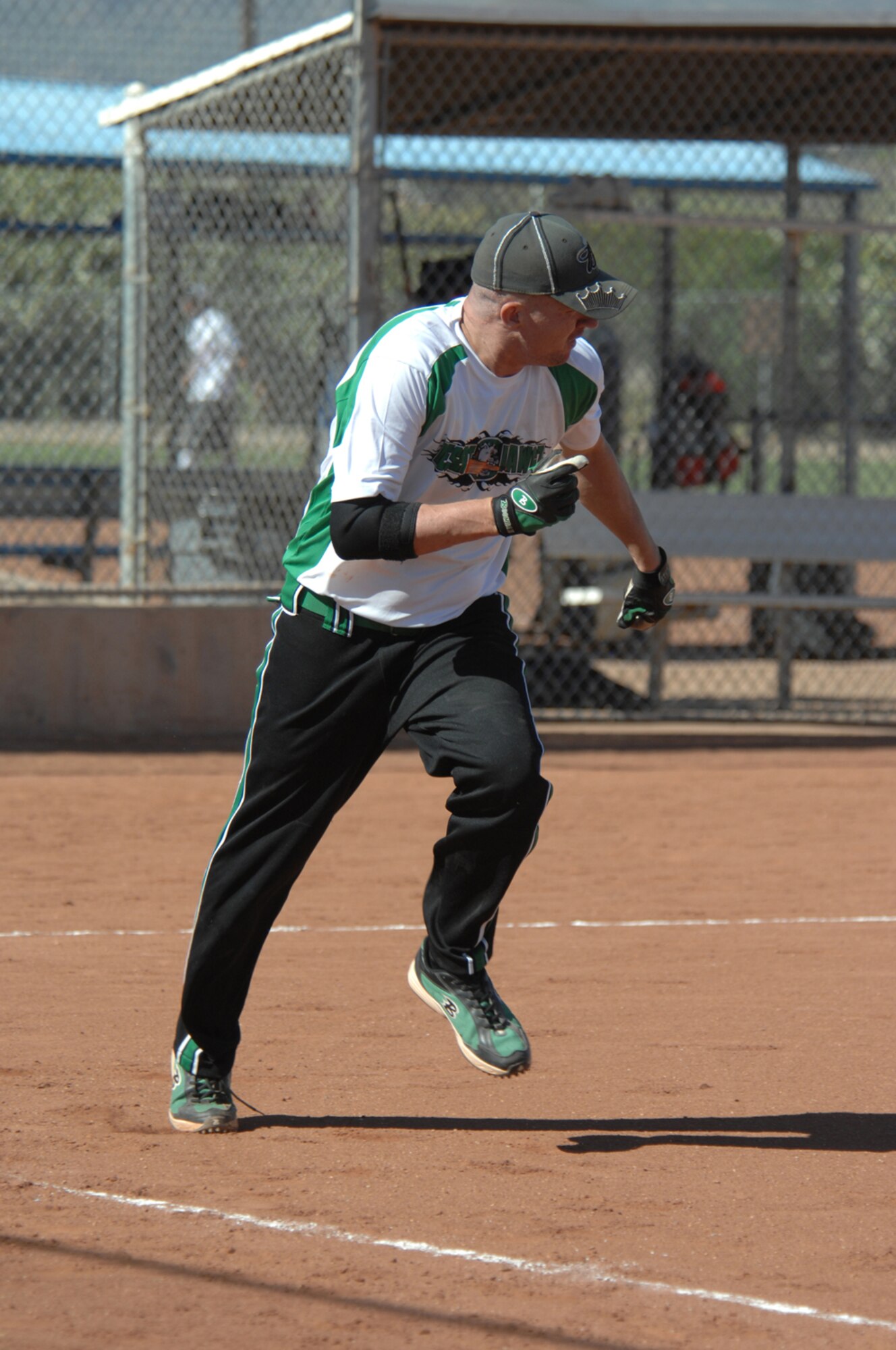 Staff Sgt. Chester Daffern, 355th Security Forces Squadron, runs to first base during the United States Specialty Sports Association Slow-Pitch Men's Softball Tournament at the Tucson Sportspark May 17. (U.S. Air Force photo by Airman 1st Class Noah R. Johnson)