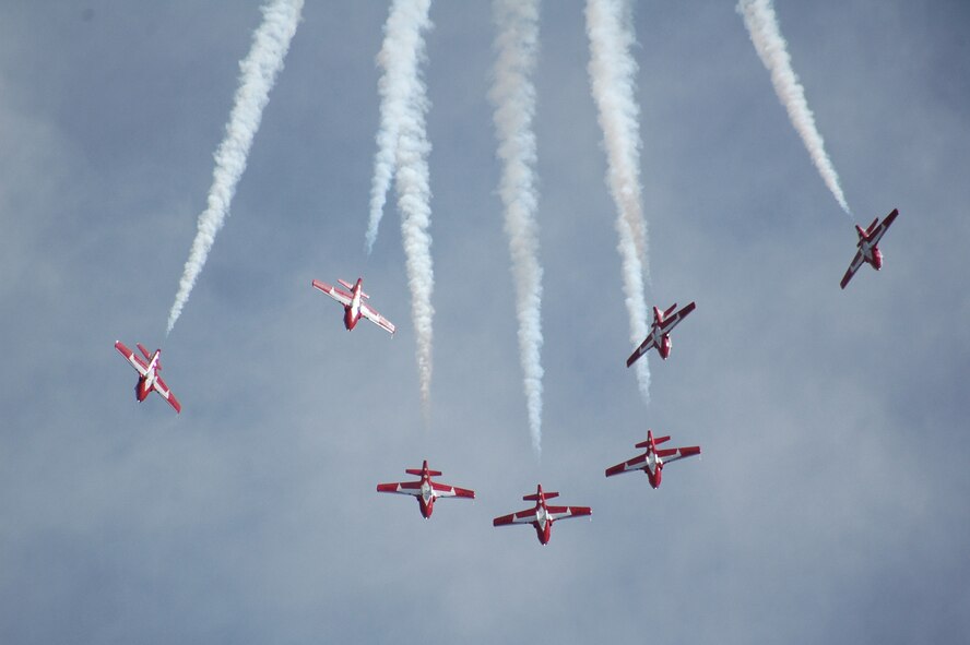 The Canadian Forces Snowbirds Aerial Demonstration Team perform over Malmstrom May 16 during a practice session prior to highlighting a two-day Air Show and Open House May 17 and 18. (U.S. Air Force photo/Airman 1st Class Emerald Ralston)