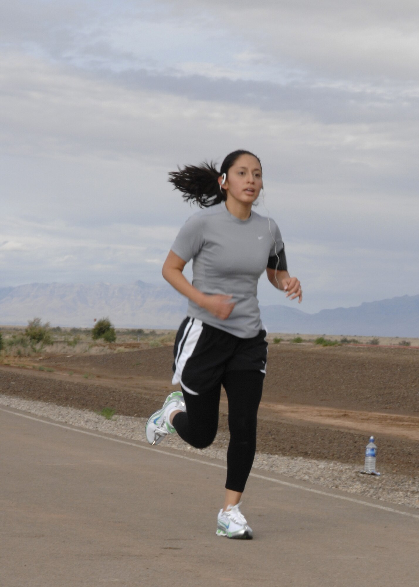 Holloman personnel participate in a 5 kilometer fun run at the base fitness center on Holloman Air Force Base, N.M., May 16. 5k races are often "fun runs," that runners and walkers can run without racing seriously. (U.S. Air Force photo/Airman 1st Class Rachel A. Kocin)