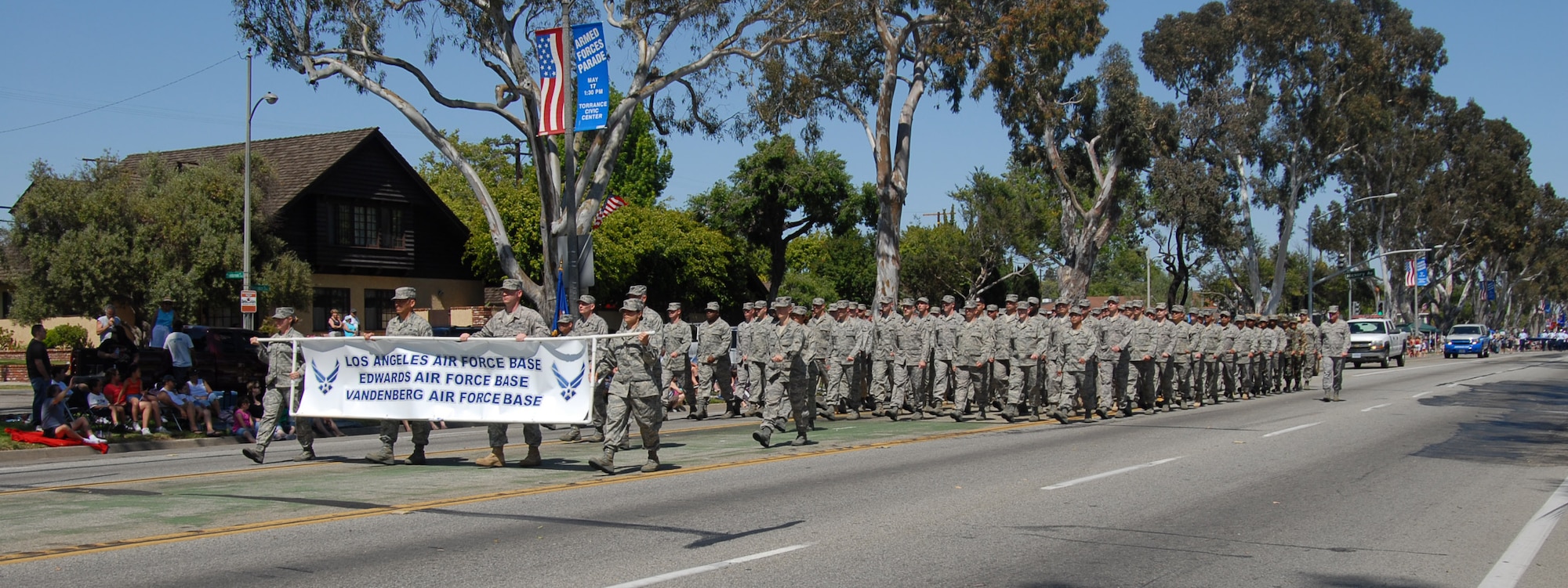 One-hundred thirty-four Airmen from Edwards, Vandenberg Air Force Base and Los Angeles AFB, march May 17 in the 49th Annual Torrance Armed Forces Day celebration in Torrance, Calif. The celebration featured various events and military exhibits including aircraft, vehicles and support equipment. (Air Force photo by Senior Airman Julius Delos Reyes)