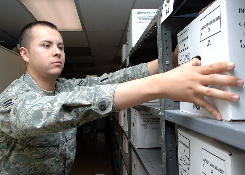 Airman First Class David Vizcaino of the 49th Maintenance Group pulls a box of files in the "staging Area" during records management training on Holloman Air Force Base, N.M., May 12.   The information manager's immersion training lasts 11 weeks here.   (U.S. Air Force photo/Airman 1st Class John D. Strong II)  