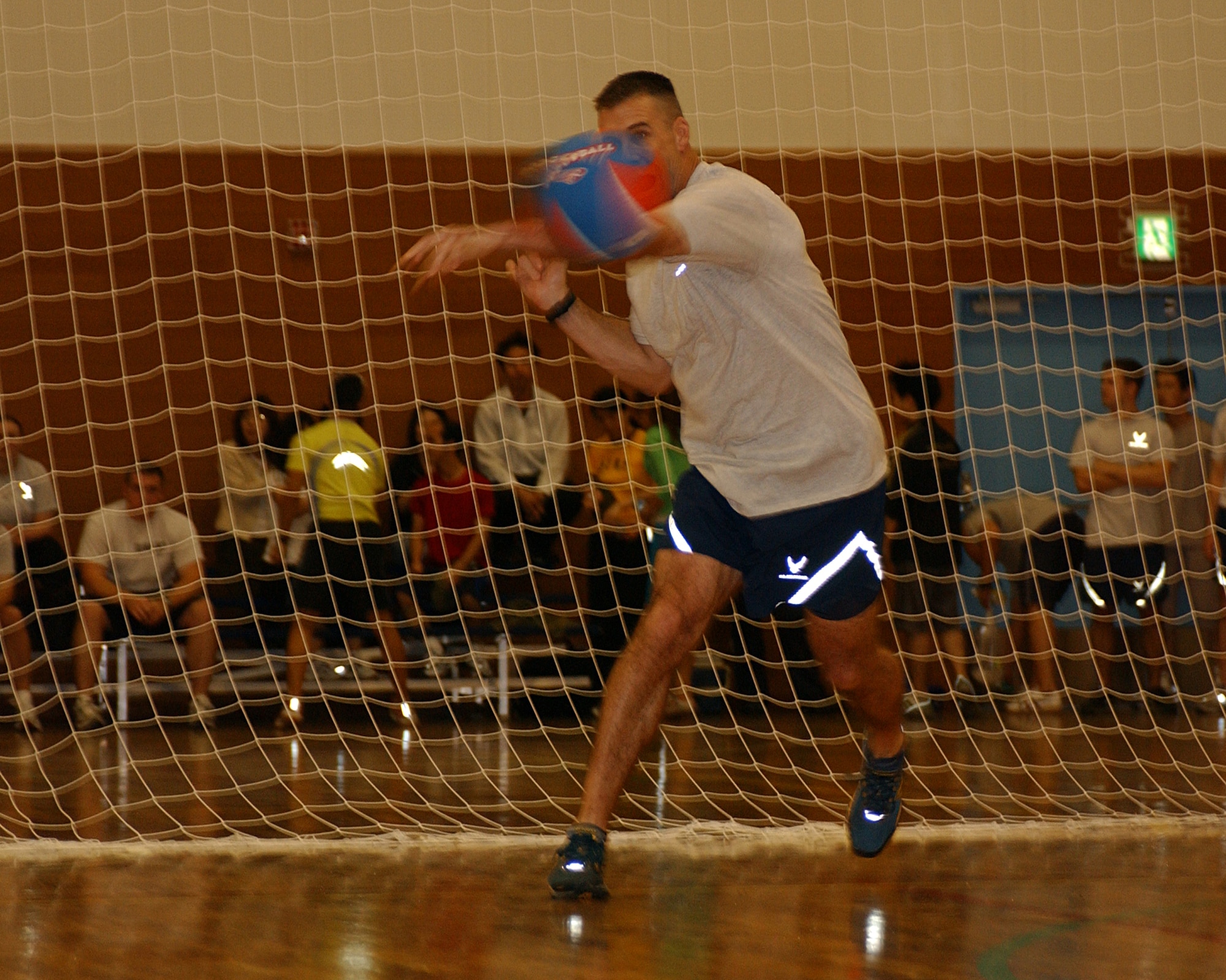 YOKOTA AIR BASE, Japan - Lt. Col. Mark Milam, from the  374th Airlift Wing Judge's Advocate office, throws a ball during a dodgeball match on Yokota's 2008 Safety and Sports Day on May 22. Sports Day gives squadrons a chance to relax and compete in a number of events such as tennis, volleyball and softball. (U.S. Air Force photo by Airman 1st Class Jonathan Fowler)                               