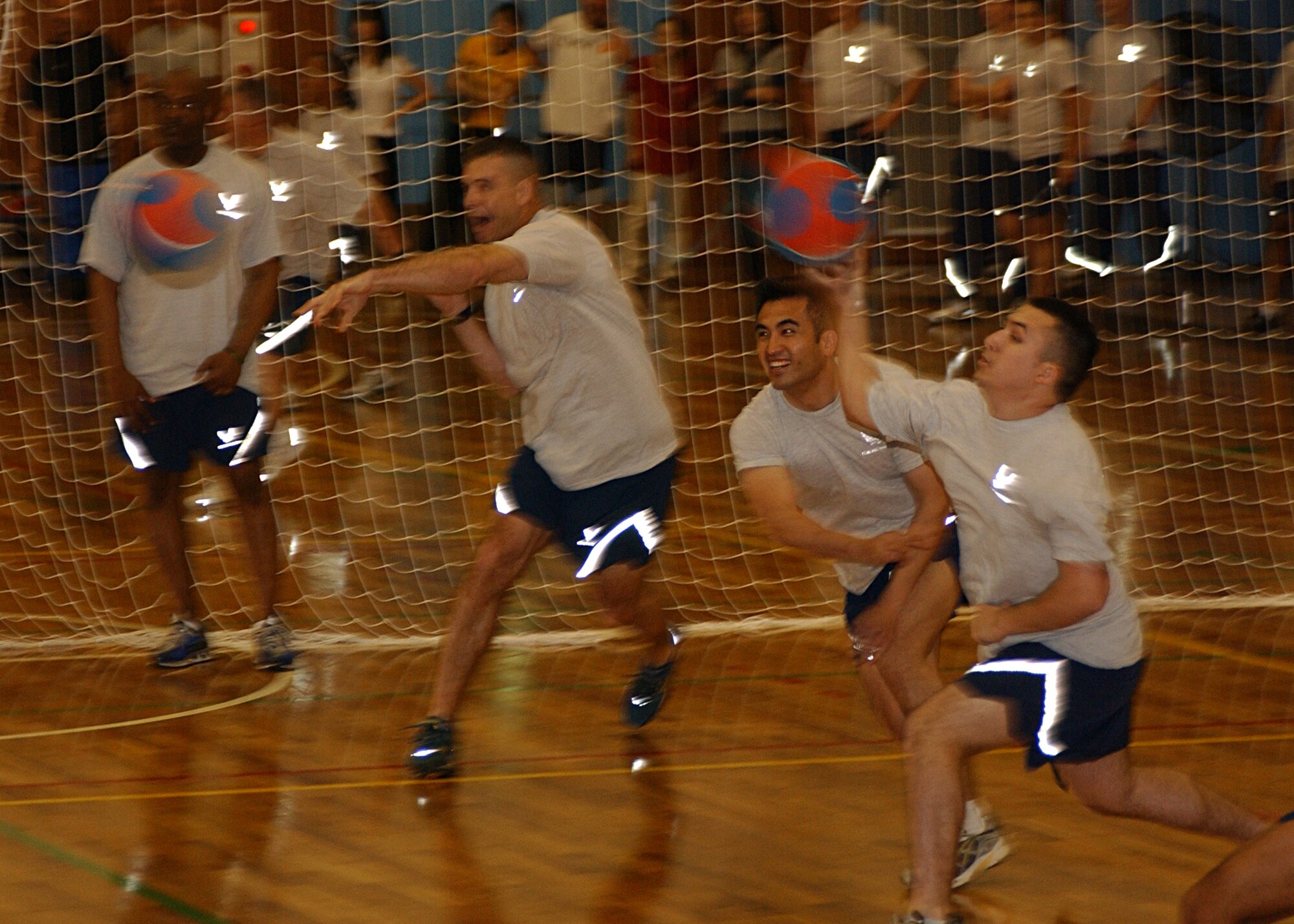 YOKOTA AIR BASE, Japan - Members of the 374th Airlift Wing dodgeball team throw dodgeballs during a match on Yokota's 2008 Safety and Sports Day. Sports Day gives squadrons a chance to relax and compete in a number of events such as volleyball, tennis and softball. (U.S. Air Force photo by Airman 1st Class Jonathan Fowler)                               