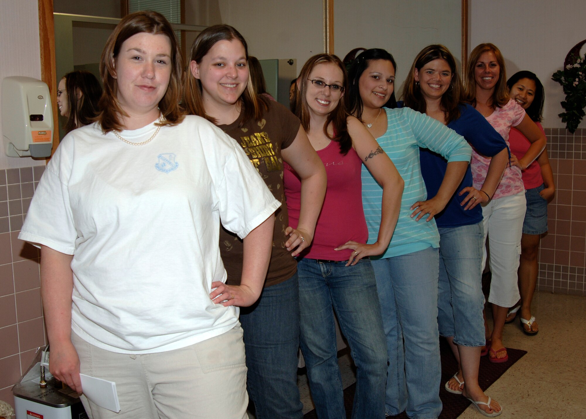 MCCONNELL AIR FORCE BASE, Kan. -- Melissa Flint, Mollie Denos, Crystal Rodriguez, Cindy Hood, Angie Ward, Courtney Hisey, and Tech. Sgt. Shirley Quevedo, 22nd Maintenance Group, participate in the Enlisted Spouses Club’s Mom’s Retreat, May 17. The ESC is made up of a group of military spouses from diverse backgrounds.  (Photo by Airman Justin Shelton) 