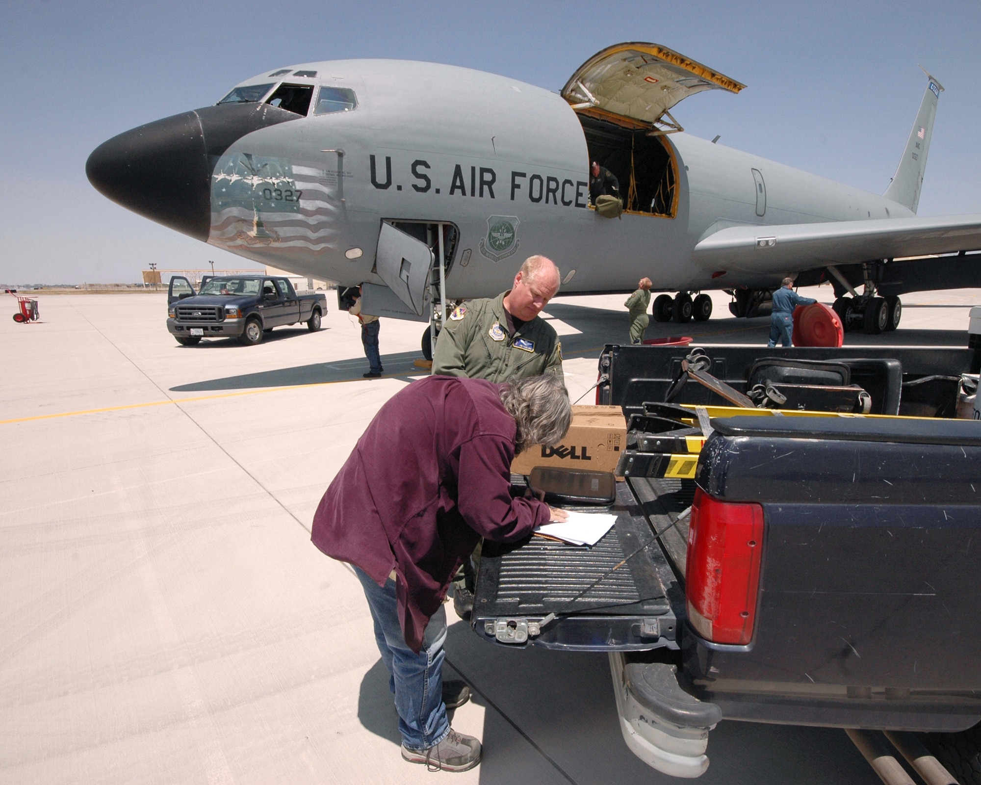 Air Force KC-135 E-model aircraft, tail number 0327, is recieved by 309th Aerospace Maintenance and Regeneration Group personeel at Davis-Monthan Air Force Base on April 24. The 50-year-old aircraft was delivered to the group for long-term storage at the 2,600-acre facility after serving the 151st Air Refueling Wing, Utah Air National Guard for more than 20 years. The 309th AMARG is a one-of-a-kind specialized facility within the Air Force Materiel Command's 309th Maintenance Wing at Hill AFB, Utah. The 309th AMARG provides critical aerospace maintenance and regeneration capabilities for Joint and Allied/Coalition warfighters in support of global operations and agile combat support for a wide range of military operations. U.S. Air Force photo by: Master Sgt. Burke Baker