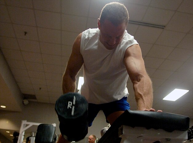 David Polmanteer lifts weights in the weight room of the base Fitness and Sports Center. Polmanteer is from the 437th Maintenance Squadron. (U.S. Air Force photo/Senior Airman Nicholas Pilch)