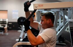 Rob Moore lifts weights in the weight room of the base Fitness and Sports Center May 21.  Moore is from the 437th Maintenance Operations Squadron. (U.S. Air Force photo/Senior Airman Nicholas Pilch)
