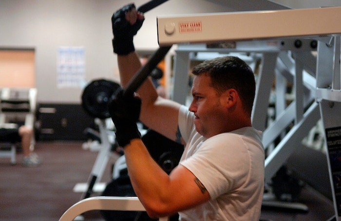 Rob Moore lifts weights in the weight room of the base Fitness and Sports Center May 21.  Moore is from the 437th Maintenance Operations Squadron. (U.S. Air Force photo/Senior Airman Nicholas Pilch)