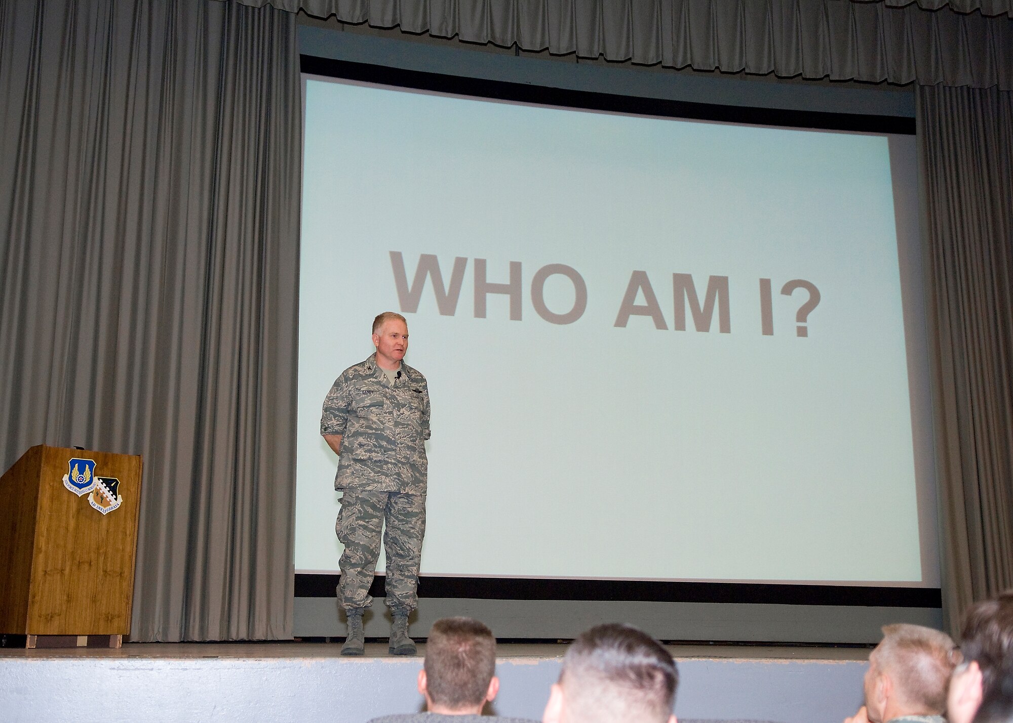 EDWARDS AIR FORCE BASE, Calif. -- Col. Jerry Gandy, 95th Air Base Wing commander, talks to ABW Airmen during his first commander's call at the base theater here May 21. During the talk, Colonel Gandy discussed his leadership style and answered questions. He took command of the 95th ABW during an appointment to command ceremony at building 3000 here May 16.  (Air Force photo by Mike Cassidy)