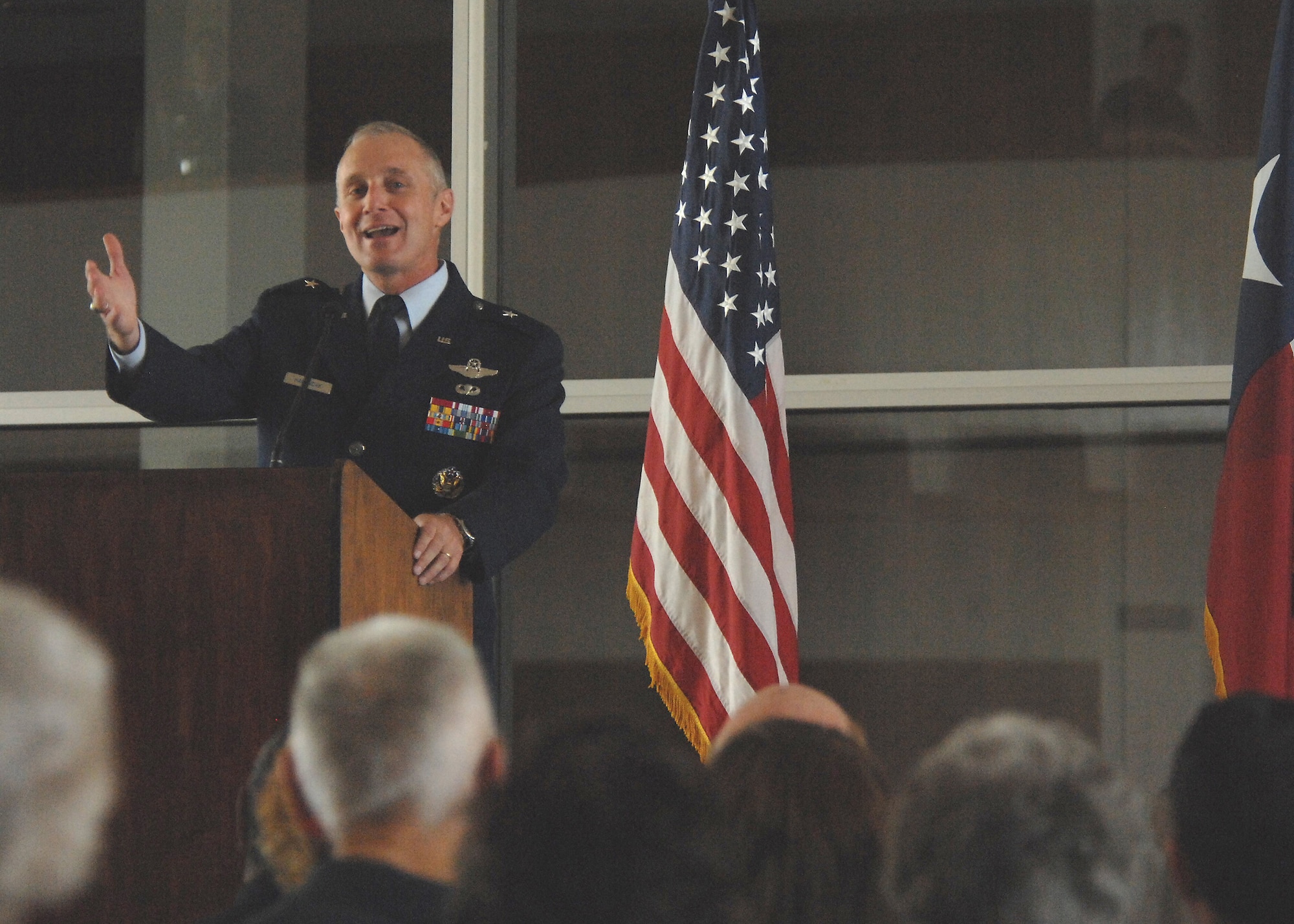 DYESS AIR FORCE BASE, Texas-- Brigadier General Garrett Harencak expresses his support to the Dyess and Abilene community during the presentation of the military painting called, "Our Heroes" at the Abilene Civic Center, May 20. The painting will be on display in various Abilene locations until the new Abilene Veterans Cemetery will open in the spring of 2009. (U.S. Air Force Photo by Airman 1st Class Stephen Reyes)