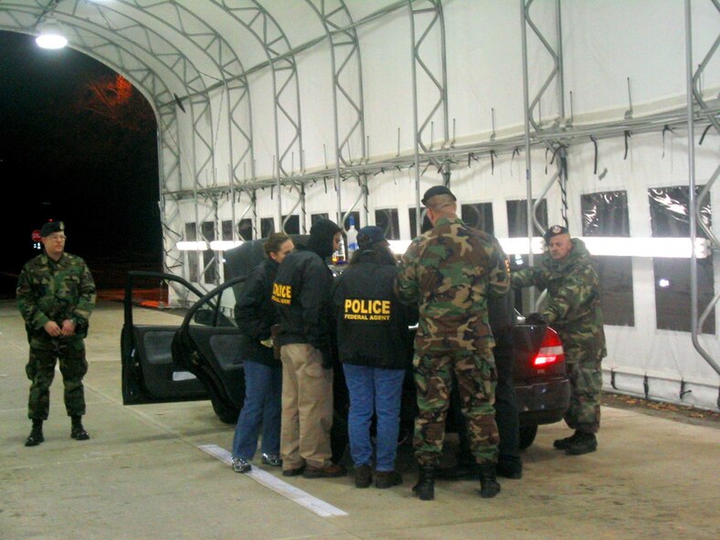 AFOSI Special Agents participate in Operation Nighthawk. In an effort to curb DUIs and underage drinking base leadership uses AFOSI and Security Forces to randomly check vehicles at entry gates and directs drivers to report for random urinalysis testing.
(U.S. Air Force photo)