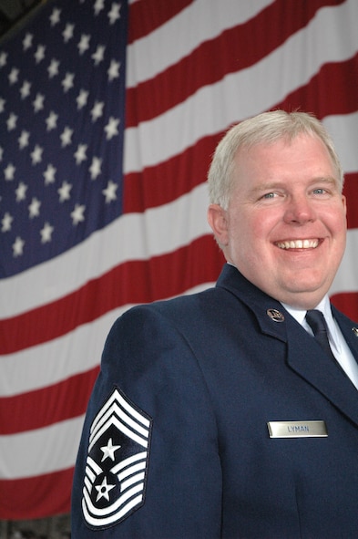 932nd Airlift Wing Command Chief Master Sgt. Merle Lyman hangs up his Belleville boots one last time as he retires during the June 7 unit training assembly.  He has spent over 29 years serving his country and the Air Force Reserve.  Photo/Maj. Stan Paregien
