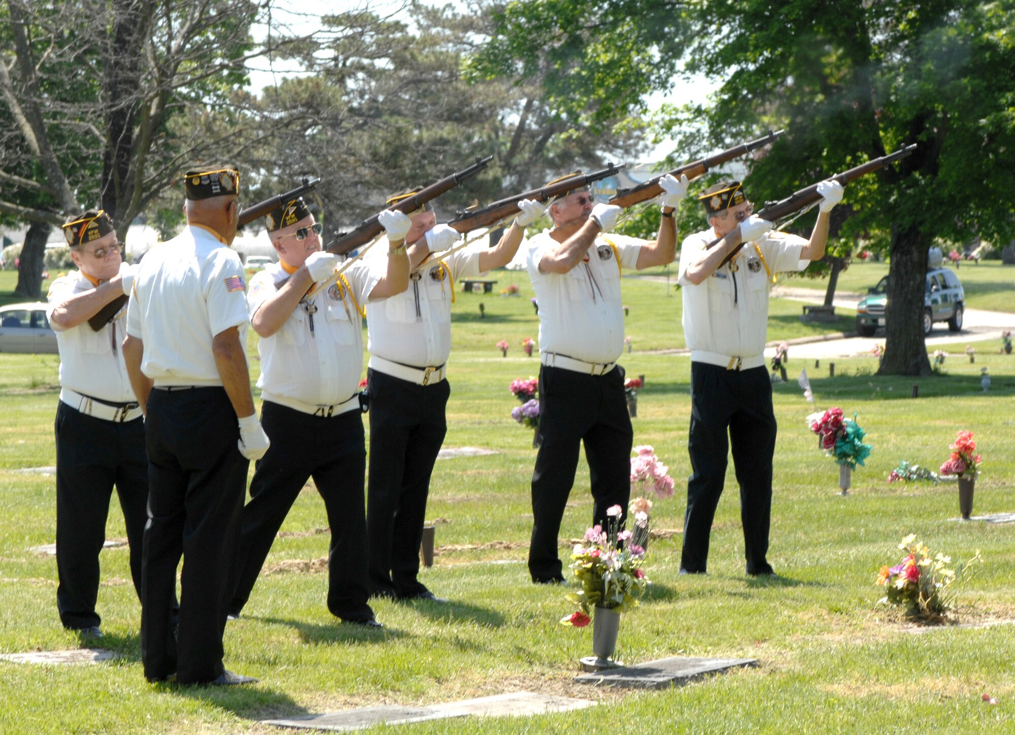 SEDALIA, Mo., - A VFW Post 2591 firing squad renders a 21-gun salute at the conclusion of the 20th Annual Whiteman Memorial Wreath Laying Ceremony May 17 in Sedalia's Memorial Park Cemetery.  The ceremony honored 2nd Lt. George A. Whiteman, a Sedalia native and the first American air casualty of World War II. Lieutenant Whiteman's P-40 fighter, "Lucky Me," was shot down as he took off during the Japanese attack on Pearl Harbor Dec. 7, 1941. (U.S. Air Force/1st Lt. Matthew Miller)