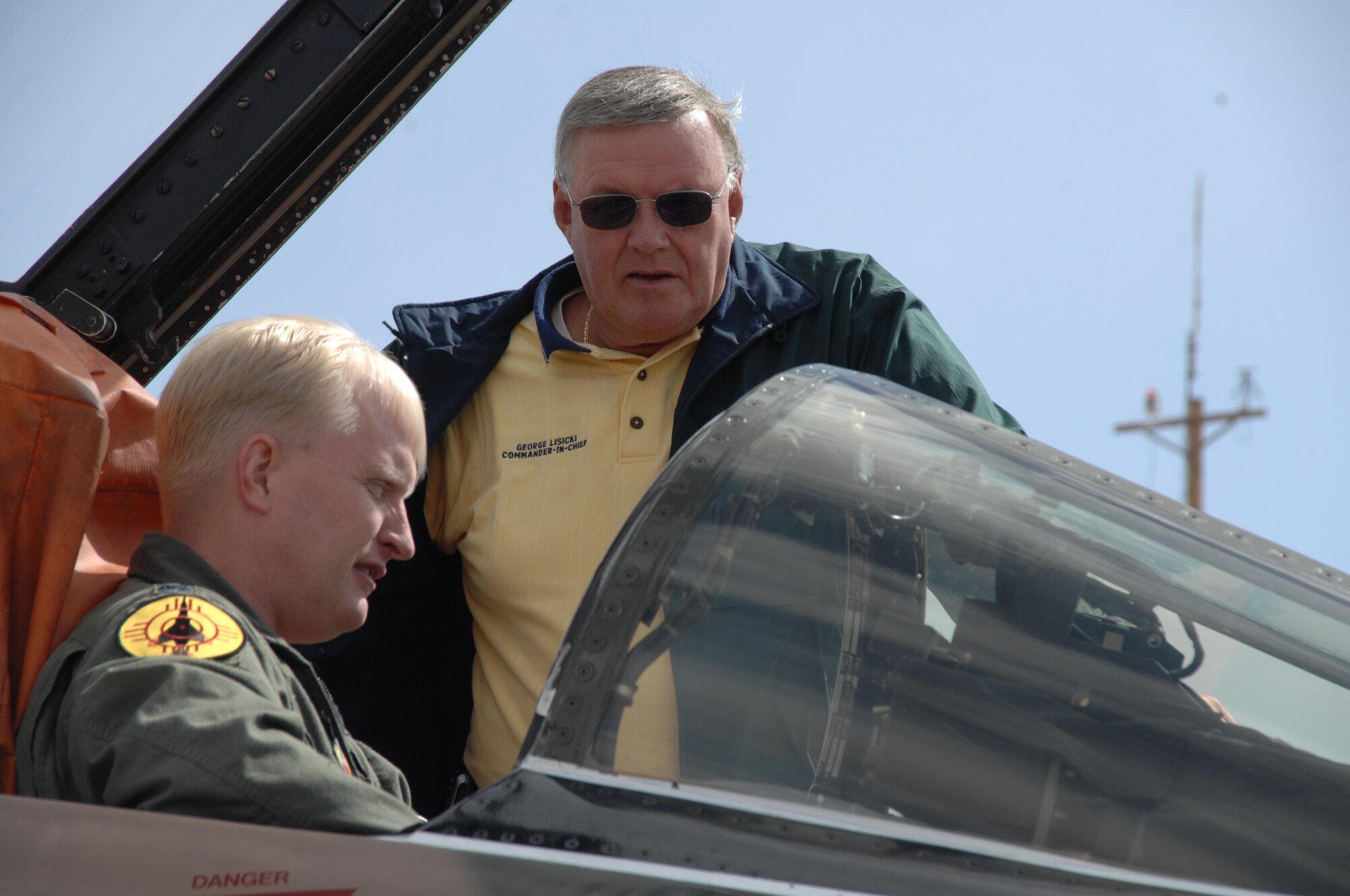 Lt. Col. Ryan Luchsinger, 82nd Aerial Targets Squadron Det. 1 commander, briefs George Lisicki, Veterans of Foreign Wars commander-in-chief, about the unique aspects of the QF-4 drone May 14 at Holloman Air Force Base, N.M.  The 82nd ATRS is the only squadron to have F-4s in the Air Force.  U.S. Air Force photo  