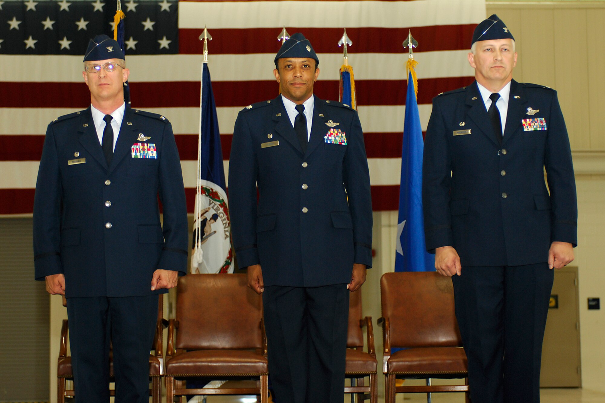 LANGLEY AIR FORCE BASE, Va. -- Standing left to right are Colonel  Jay M. Pearsall, Lt. Col. Bryan K. Turner and Colonel Mark A. McCauley, during a 192d Fighter Wing Change of Command  here May 17.  (U.S. Air Force photo/Airman Gul Crockett)