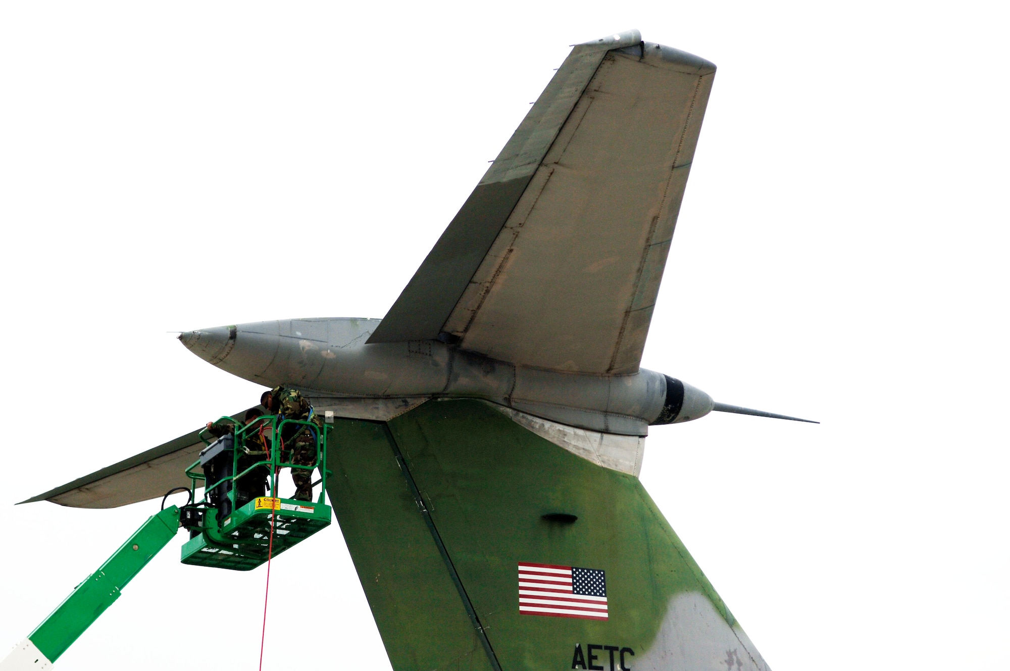 SCOTT AIR FORCE BASE, Ill. -- Structural maintainers from the 653rd Combat Logistics Support Squadron at Robins Air Force Base, Ga., lock out the rudder on a C-141 Starlifter aircraft at MidAmerica airport, close to Scott Air Force Base, Ill. This aircraft is one of five that will be on permanent display as part of the Scott Field Heritage Airpark. (U.S. Air Force photo/Tech. Sgt. Tony Tolley)