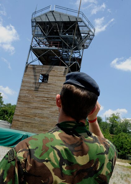 MOODY AIR FORCE BASE, Ga. -- Great Britain's Royal Air Force Flight Lt. Dave Martin, RAF Honington Force Protection Centre, looks at a rappel tower used by the 820th Security Forces Group for training purposes here May 20. Members of the RAF came here to tour and learn about the 820th SFG mission. (U.S. Air Force photo by Airman 1st Class Brittany Barker)
