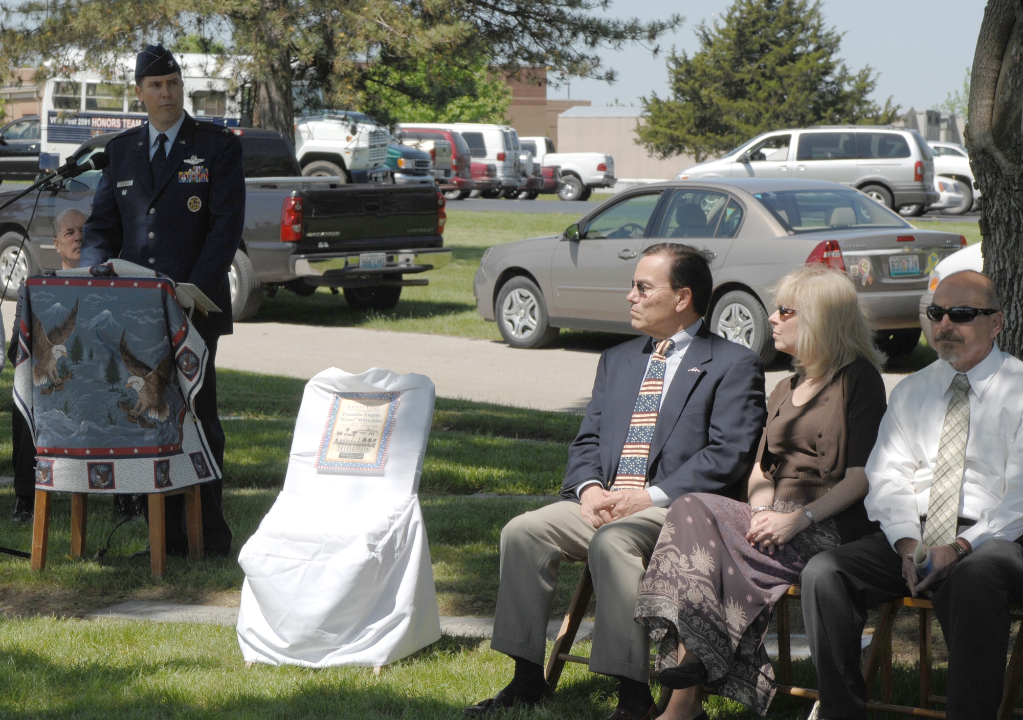 SEDALIA, Mo., - Relatives of the George A. Whiteman listen to keynote speaker Col. John W. Robinson Jr., 509th Bomb Wing vice commander, during the 20th Annual Whiteman Memorial Wreath Laying Ceremony in Sedalia's Memorial Park Cemetery. (U.S. Air Force/1st Lt. Matthew Miller)