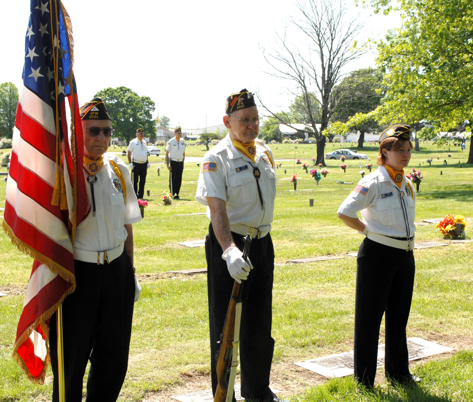 SEDALIA, Mo., - Members of VFW Post 2591, from left to right, Sylvester Voss, Rudy Kohrs and Ditte Barnes were part of an honor guard at the 20th Annual Whiteman Memorial Wreath Laying Ceremony for 2nd Lt. George A. Whiteman in Sedalia's Memorial Park Cemetery. (U.S. Air Force/1st Lt. Matthew Miller)