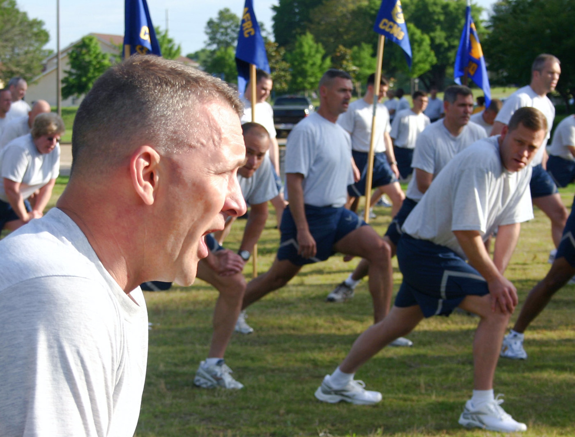 Chief Master Sgt. Mark Brejcha calls out the count for leg stretches during warm-ups for a formation run May 18 at Maxwell Air Force Base, Ala. More than 350 command chief master sergeants, career field managers, professional military education commandants and other key senior enlisted leaders kicked off the 2008 Senior Enlisted Leader Summit with a 2.2-mile formation run at Maxwell's Gunter Annex. Chief Brejcha is the 91st Space Wing command chief master sergeant at Minot AFB, N.D. (U.S. Air Force photo/Staff Sgt. Jason Lake) 
