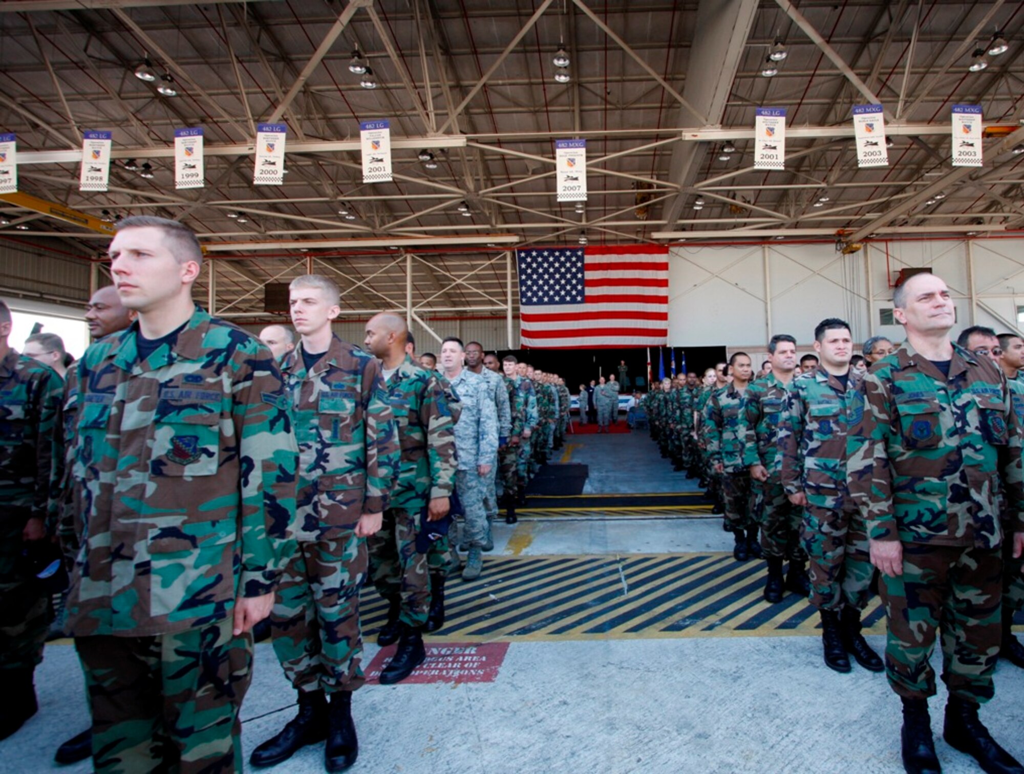 Hundreds of 482nd Fighter Wing reservists stand in formation during a dual ceremony that doubled as a change of command welcoming Col. William B. Binger as new 482nd FW commander and retirement of Col. Randall G. Falcon, the outgoing 482nd FW commander, on May 18. (Courtesy photo by Albert Siegel)