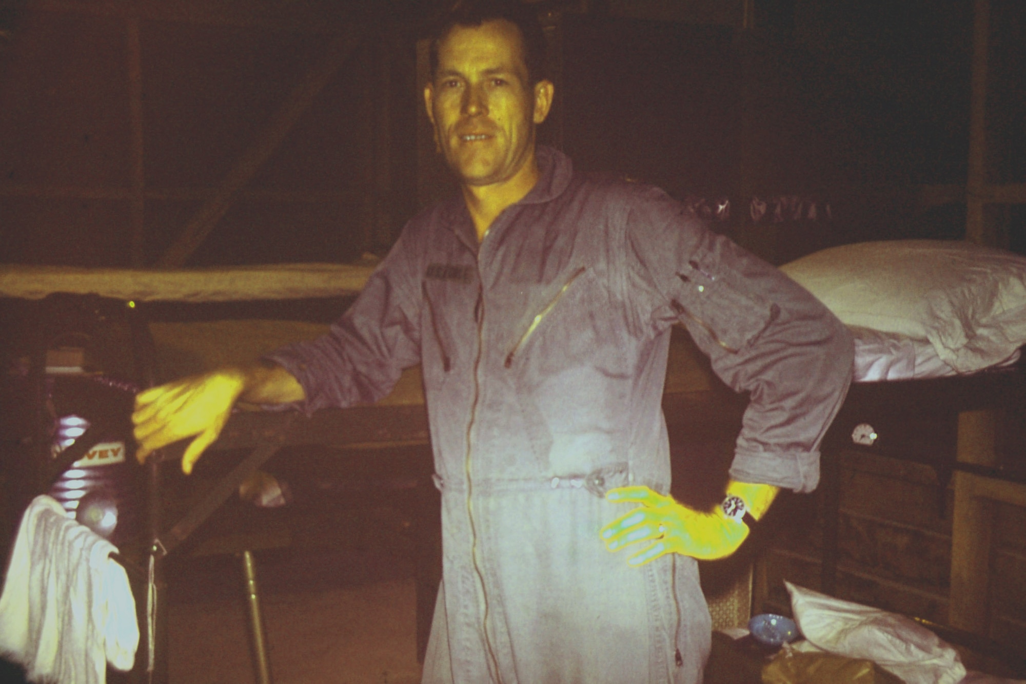 Maj. Robert F. Woods stands next to his bunk at Da Nang Air Base, Vietnam in 1968.  On June 26, 1968, Major Woods disappeared in the Quang Binh Province in Vietnam after the 02-A Skymaster he was flying crashed in a remote mountainous region.  A native of Salt Lake City, Utah, Major Woods was in the military for 20 years when he disappeared. His career began in June 1948 as an enlisted aircrew member on a C-74 Globemaster in the Berlin Airlift.  In 1951 he became an officer and a pilot flying KC-97 Stratotankers in the Korean Conflict.  In Vietnam, he served as a forward air controller in the Skymaster with the 20th Tactical Air Support Squadron in DaNang Air Base, South Vietnam. He earned his first of eight Air Medals in Korea and also earned the Distinguished Flying Cross and Bronze Star for his service in Vietnam.  On April 9, 2008, he was laid to rest at Arlington National Cemetery nearly 40 years after he disappeared.  (Photo courtesy of the Woods family)  