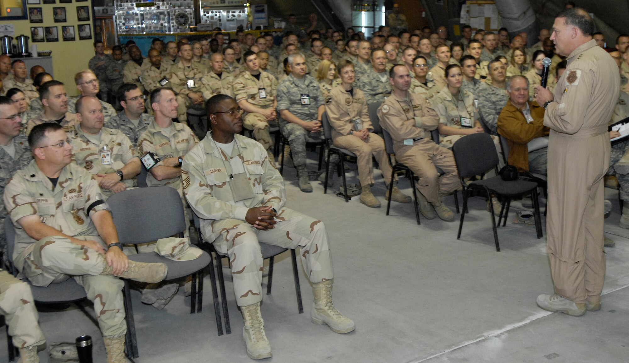 (08/05/21) MANAS AB, KYRGYZSTAN -- Lt. Gen. Gary North, 9th Air Force and U.S. Air Forces Central commander, addresses 376th Air Expeditionary Wing Airmen at commander's call here.  General North met with Airmen while touring various facilities on the base during his two-day stay on Manas AB. (U.S. Air Force/SSgt Tabitha Kuykendall)