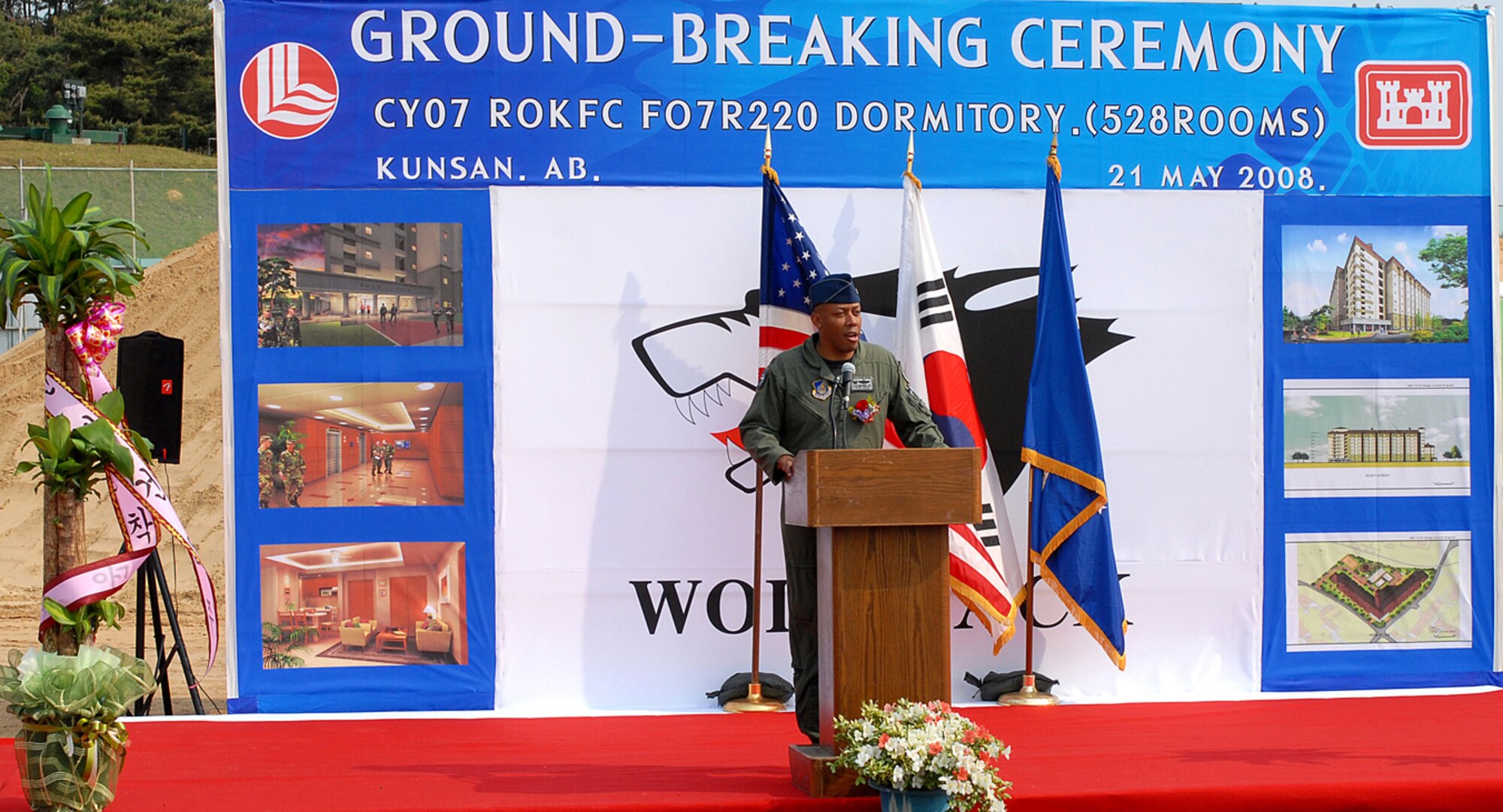KUNSAN AIR BASE, Republic of Korea --  Colonel CQ “Wolf” Brown, 8th Fighter Wing commander, gives opening remarks during the ground breaking ceremony for a new dormitory May 21 here.  The ground breaking ceremony initiates the construction of a “Dorms-4-Airmen” project, which is scheduled to be completed in September 2010. The project is part of the Air Force's initiative to improve the quality of life for Airmen. (U.S. Air Force photo/Senior Airman Giang Nguyen)