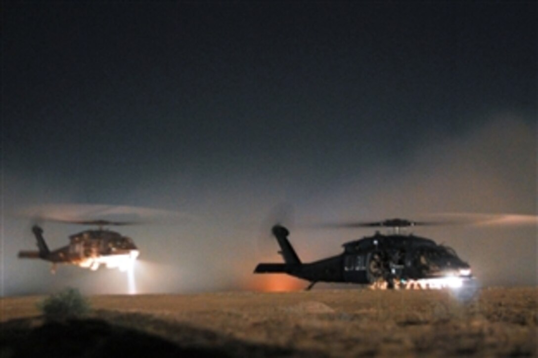U.S. soldiers and Iraqi special operations forces take off in UH-60 helicopters from Balad Air Base, Iraq, May 14, 2008, to conduct operations in Amarah, Iraq. The goal of the ongoing operations is to disrupt weapons smuggling and decrease Iranian-backed insurgency. 