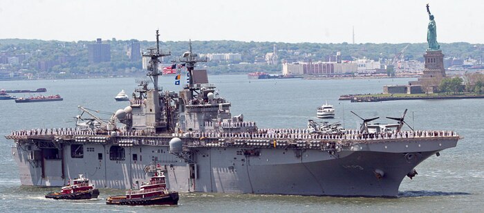 Marines and sailors line the deck of the USS Kearsarge (LHD 3) as it passes the Statue of Liberty during the Parade of Sail on the Hudson River May 21. The Parade of Sail marks the beginning of New York's annual Fleet Week.