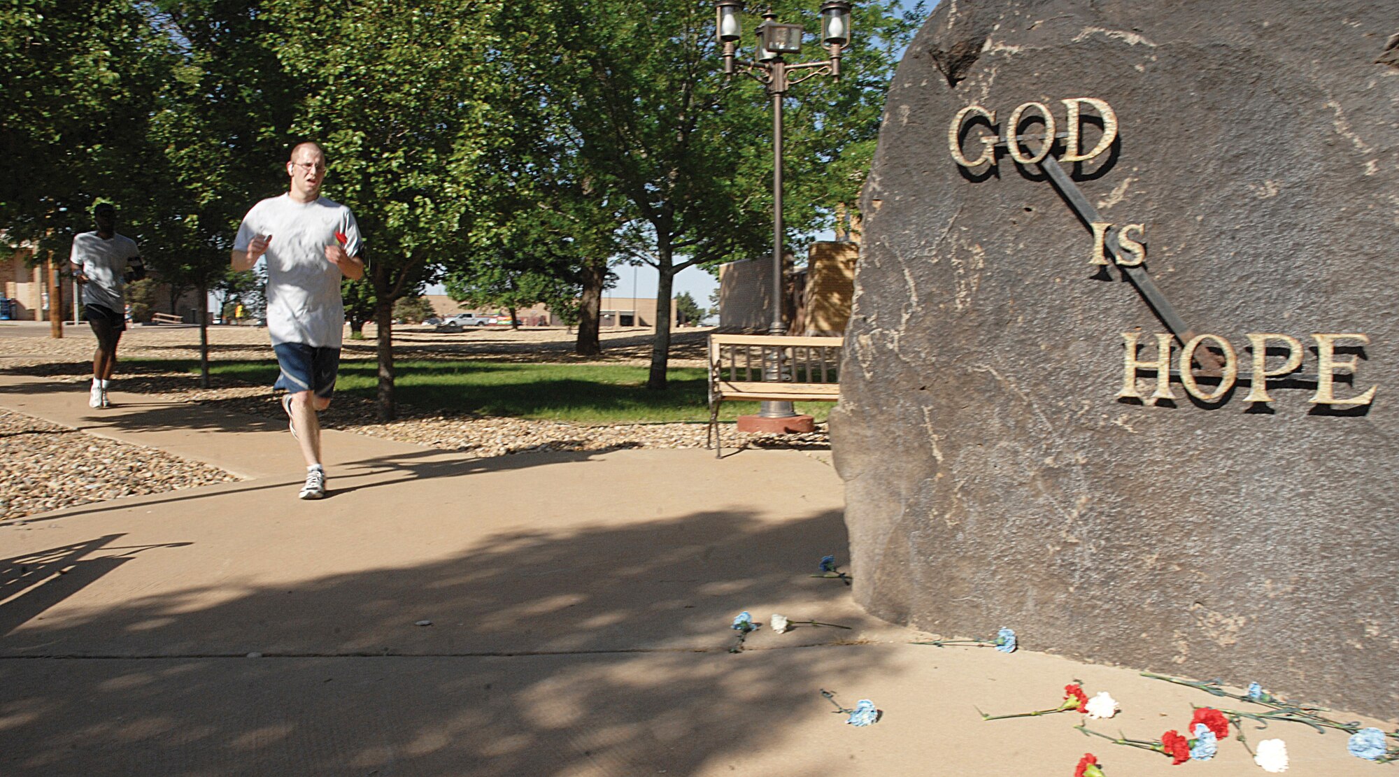 CANNON AIR FORCE BASE, N.M. -- Staff Sgt. Ricky Frye, 27th Special Operations Mission Support Squadron, approaches the Bataan Death March Memorial on base during the Gate-to-Gate run on May 22. The 5.5-mile run honored fallen warriors and was part of Memorial Day events. (U.S. Air Force photo/Airman 1st Class Evelyn Chavez)  