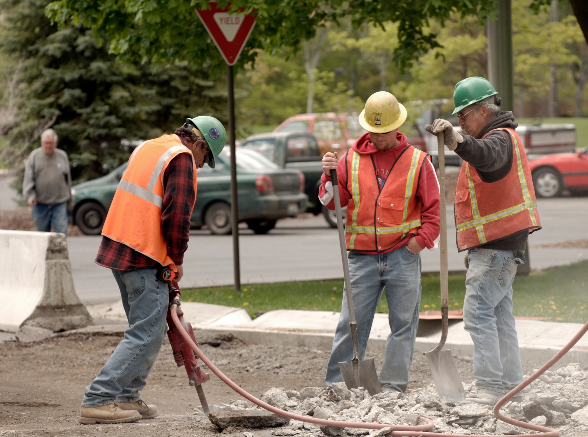 FAIRCHILD AIR FORCE BASE, Wash. – A construction worker compacts loose dirt in preparation for laying cement at the Wing Headquarters front entryway here May 21. The new entryway will restrict automobiles from unauthorized entry. (U.S. Air Force photo / Airman 1st Class Joshua Chapman) 