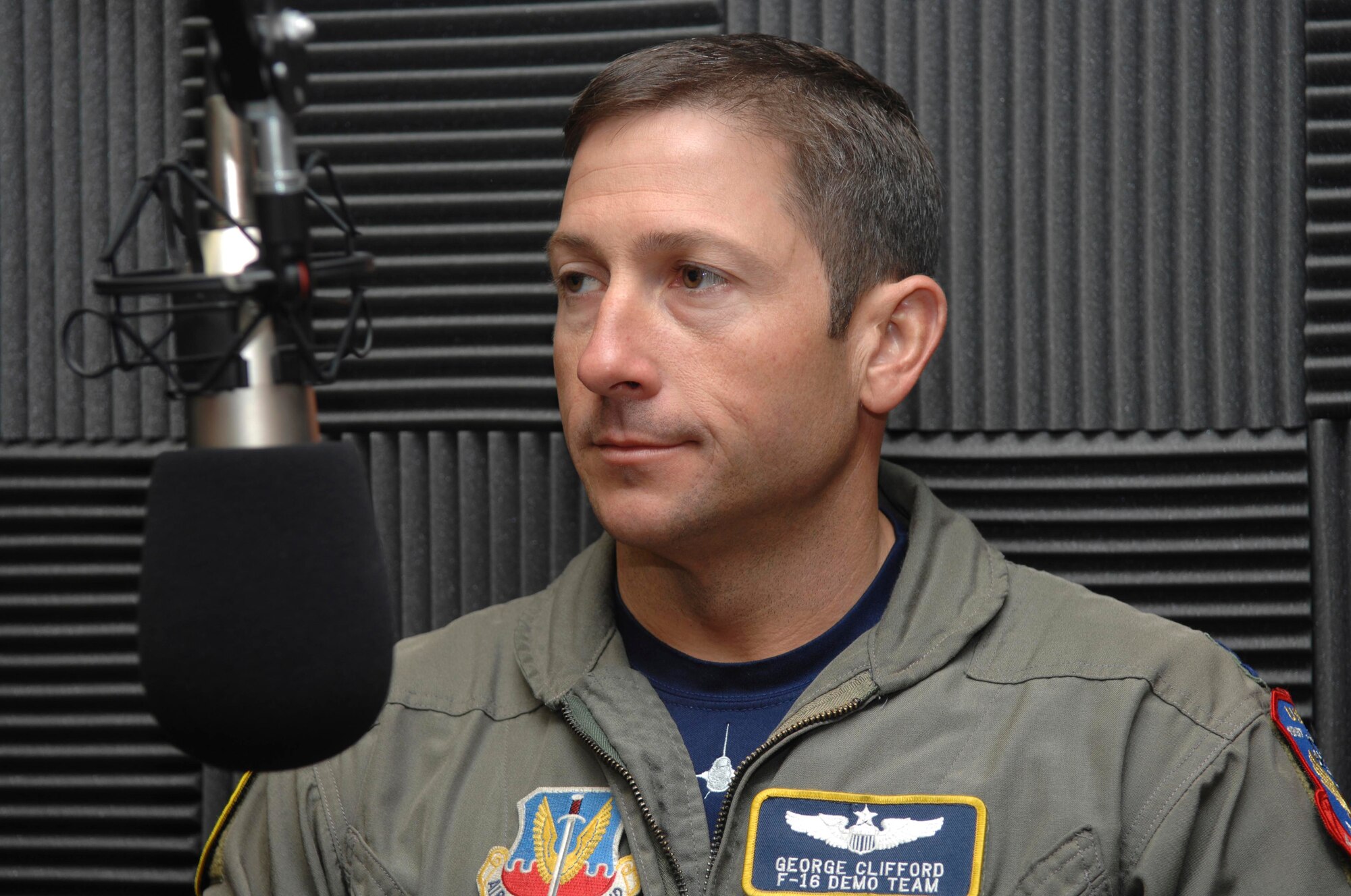 FLORENCE, S.C.-- Capt. George Clifford, F-16 Viper East Demonstration Team pilot, discusses the Florence air show, May Fly, on STAR 93.7 at Miller Communications May 22. The program broadcasted on a 6,000-watt signal covering a 40-mile radius with daytime coverage in Florence, Darlington, Hartsville, Timmonsville, Lake City and Bishopville. (U.S. Air Force photo/Staff Sgt. Nathan Bevier)